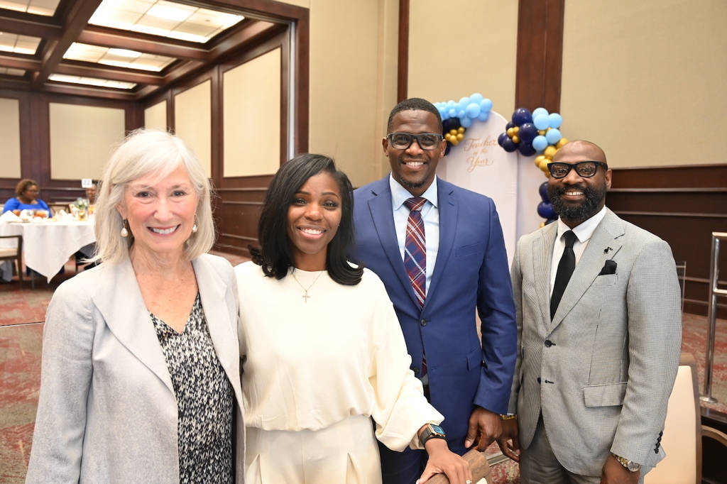 Board Members Mary Boehm and Yamika Foy, Board President Sherman Collins and Board Vice President James Sullivan