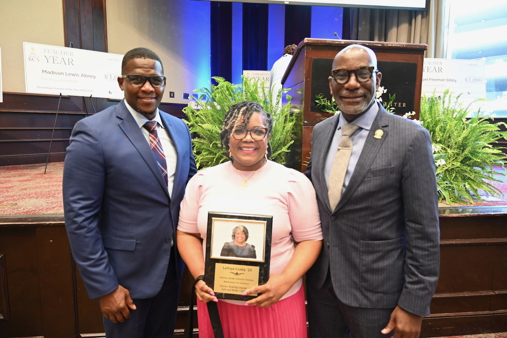 Board President Sherman Collins, NBCT LaToya Crosby, and Superintendent Dr. Mark Sullivan