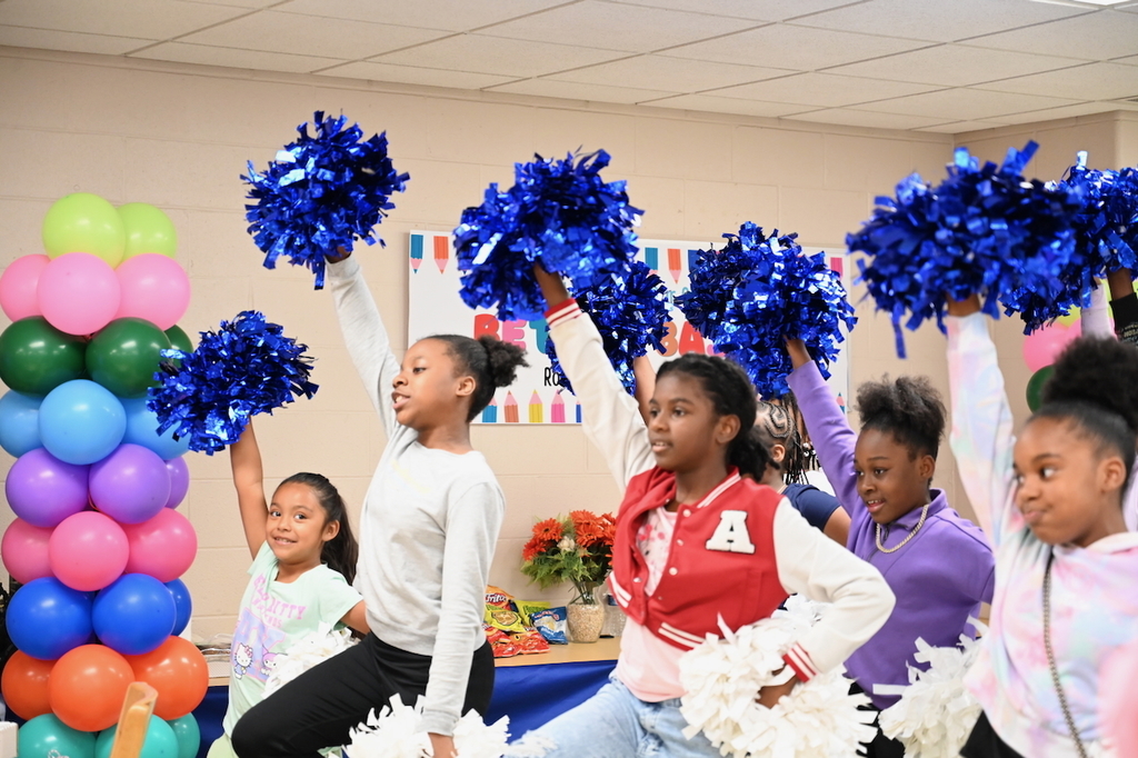 Robinson Elementary School cheerleaders greet Better Basics!