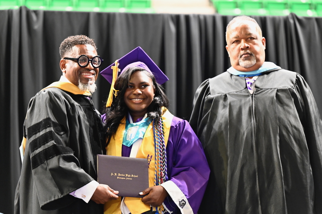 AD Tyrus Moss and his daughter Brooke with Principal Hudson