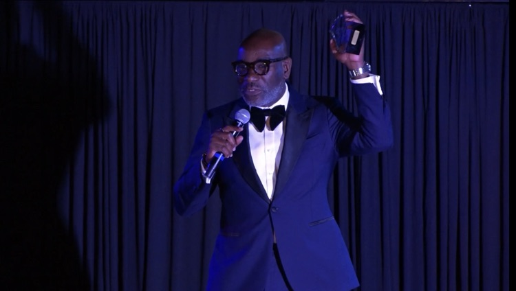 Superintendent Dr. Mark Sullivan receives the Education Leadership Award. 