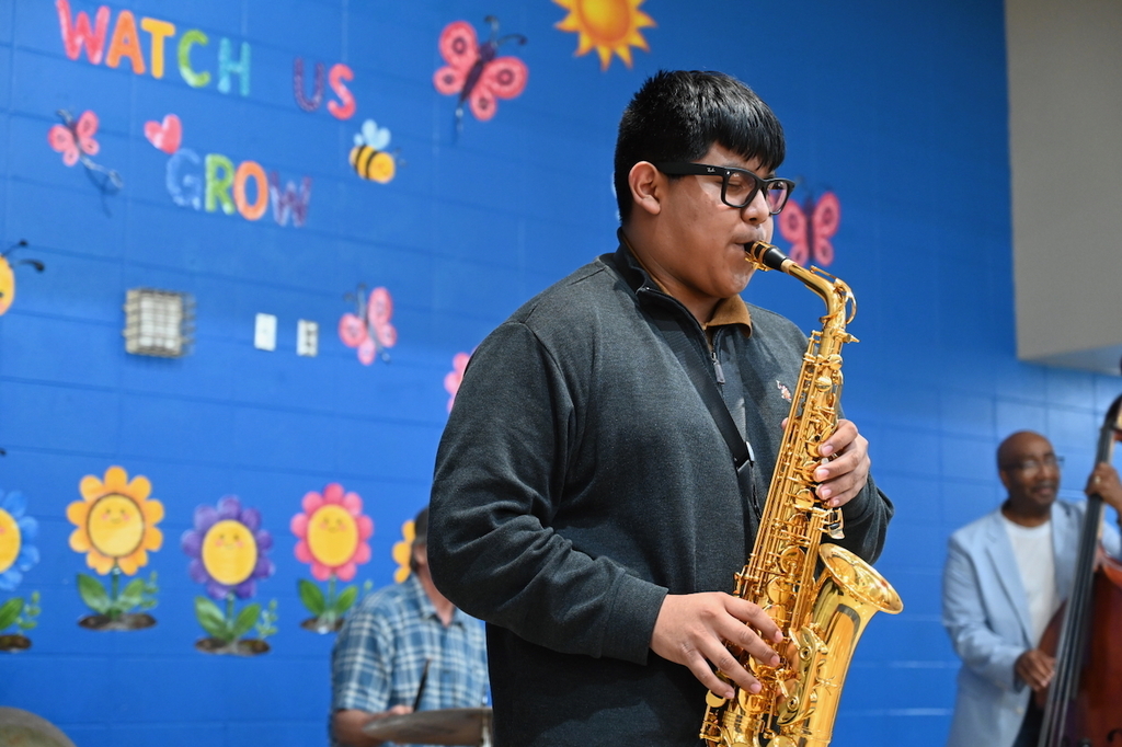 Woodlawn’s Fernando Gonzalez sat in with the band on saxophone for a song