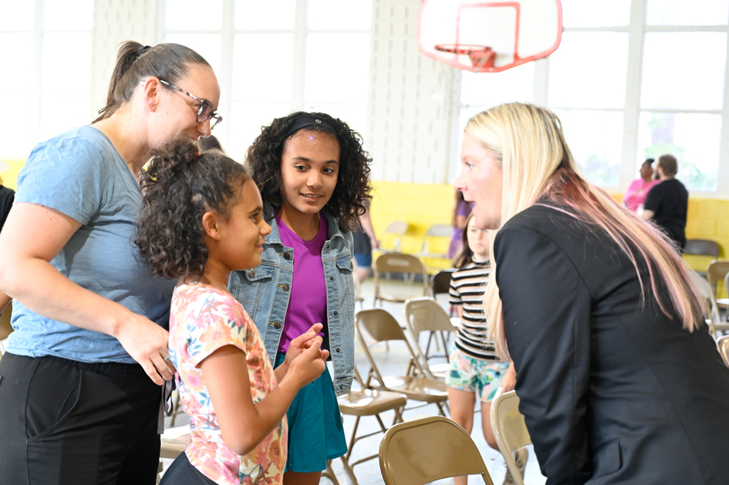 Dr. McGee greets a family