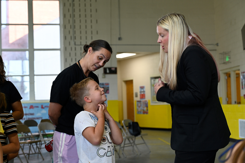 Dr. McGee greets a family