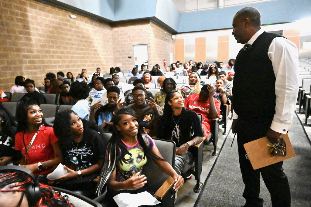 New Principal Dr. John C. Lyons, Jr. greets seniors at P.D. Jackson Olin High School