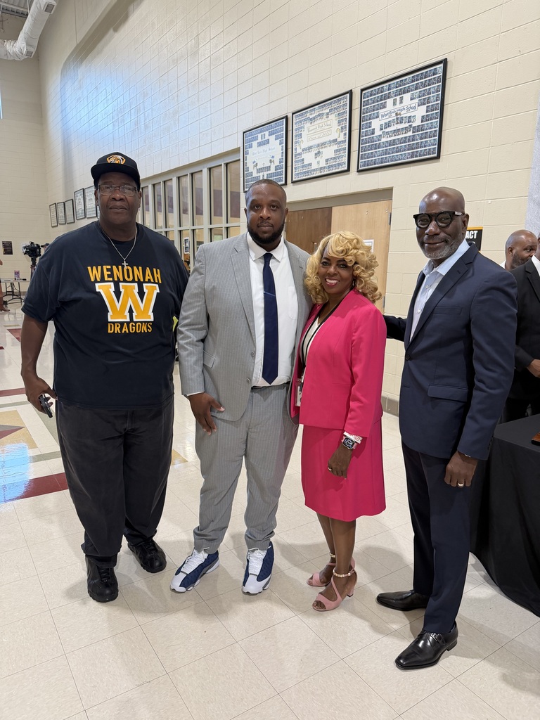Board Member Walt Wilson, Wenonah Principal Jerry Davenport, Instructional Superintendent Dr. Janice Drake, and Superintendent Dr. Mark Sullivan