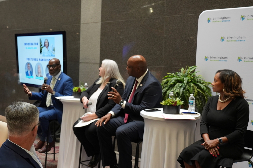 Dr. Mark Sullivan speaks as panelists Dr. Sherelene McDonald, Dr. Lewis Brooks, and Autumm Jeter look on