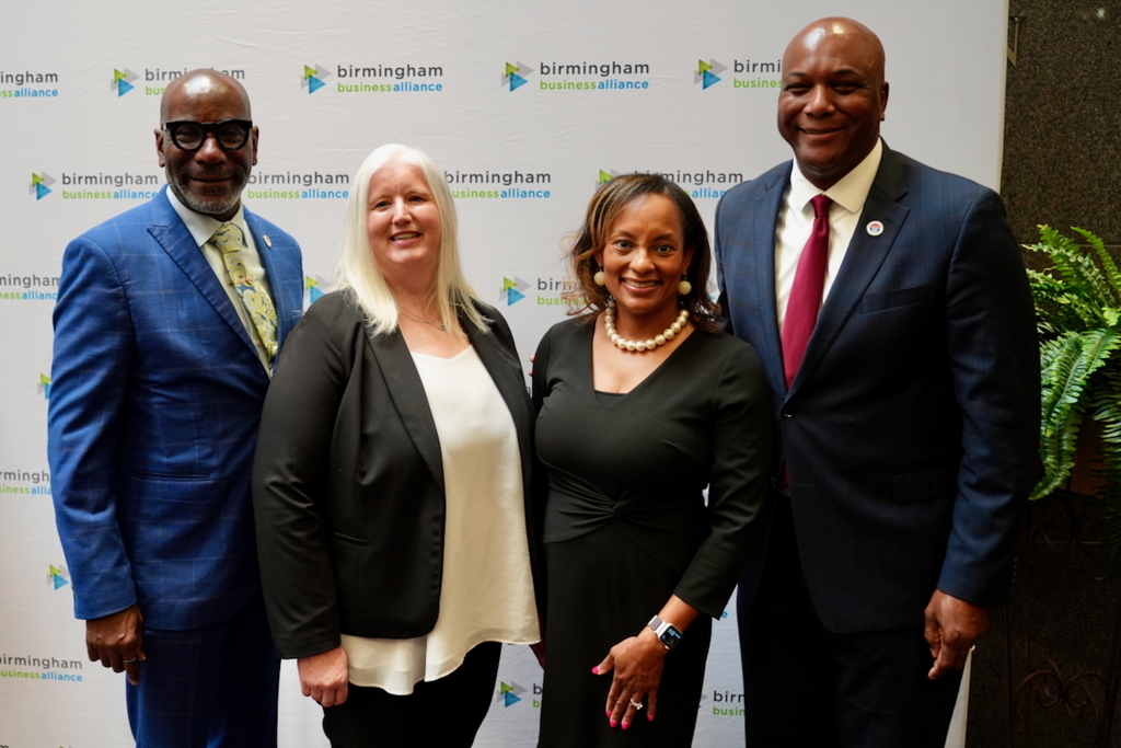 Dr. Mark Sullivan, Dr. Sherelene McDonald, Dr. Lewis Brooks, and Dr. Autumm Jeter look on