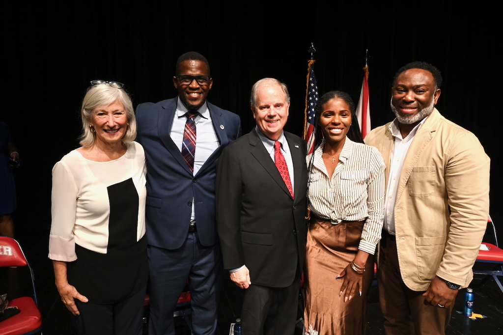 Board Member Mary Boehm, Board President Sherman Collins, Alabama Gubernatorial Candidate Doug Jones, and Board Members Yamika Foy and Derrick Billups