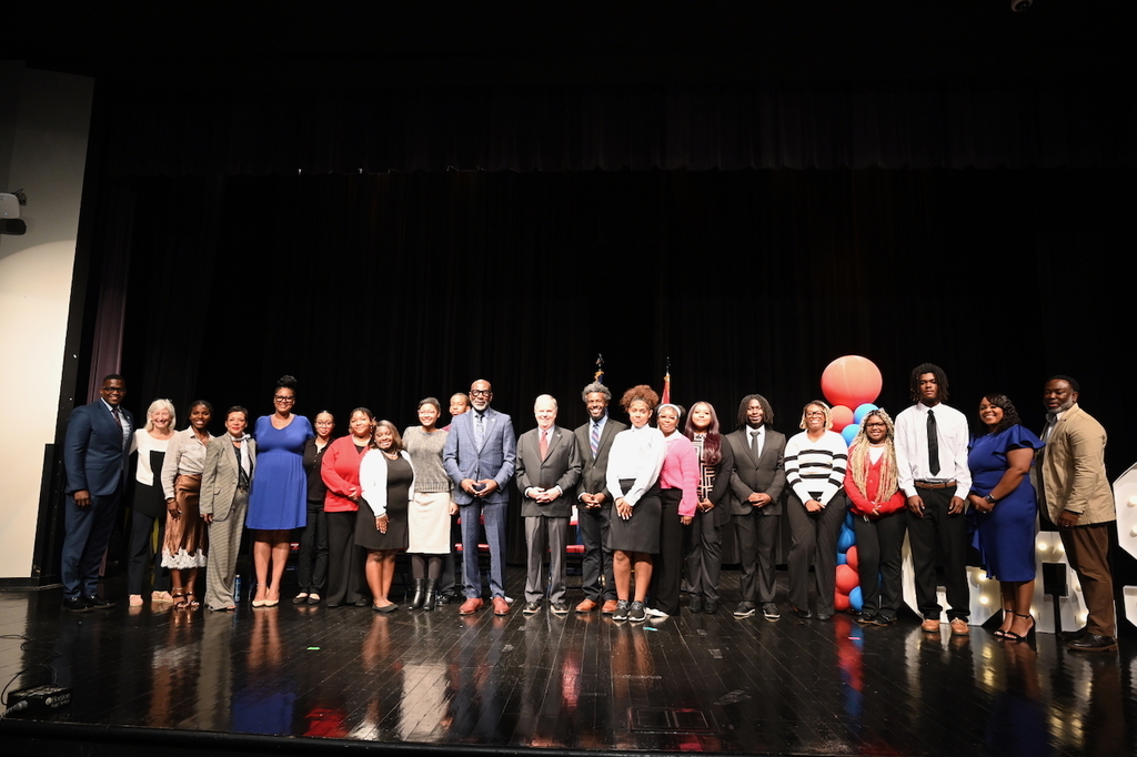 Board members, Carver SGA, faculty and administration, and Superintendent Dr. Mark Sullivan pose for a photo with former U.S. Senator Doug Jones