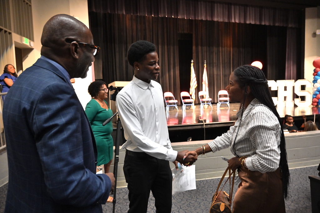 Board MemberYamika Foy meets Carver scholar Dylan Leonard