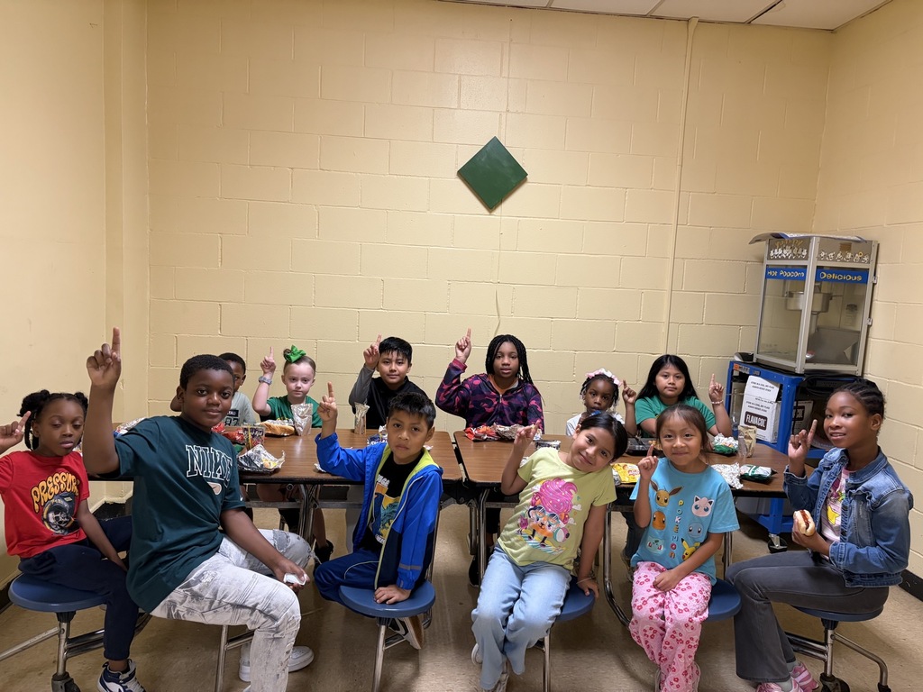 students sitting at lunch table