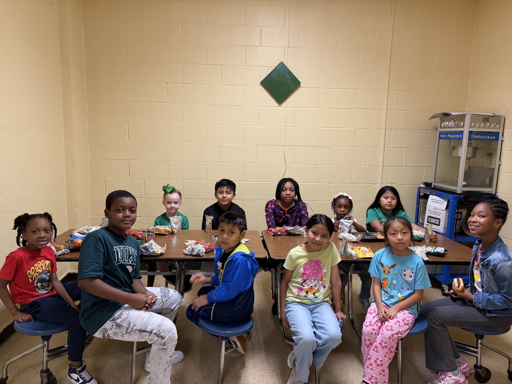 students sitting at lunch table