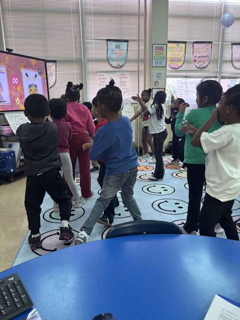 students standing on a rug