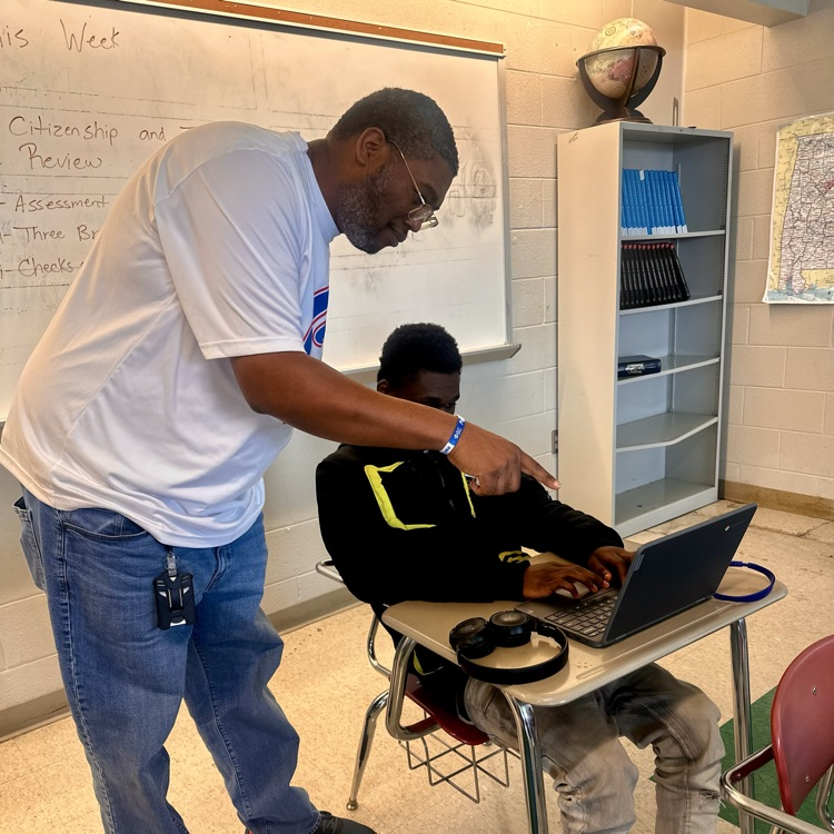 Mr. Cooke and student 