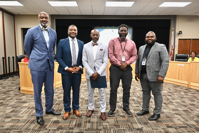 Pictured from left to right: Operations Officer Michael Moor, Chief of Staff Dr. Terry Lamar, Kenneth McIntosh, Bush Hills STEAM Academy Principal Dr. Bobby Phillips and Board Member Antwon Womack