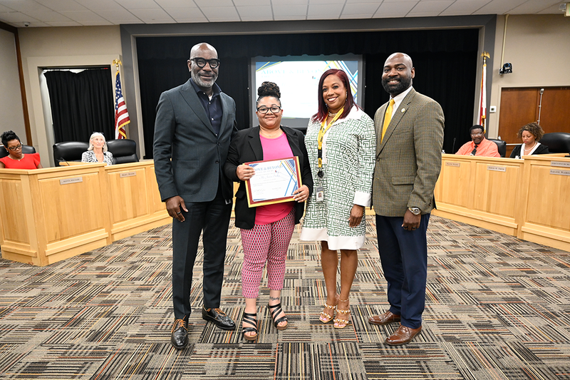 Superintendent Dr. Mark Sullivan, Janica Dudley, Dr. Taqua Lewis, and Board Member James Sullivan