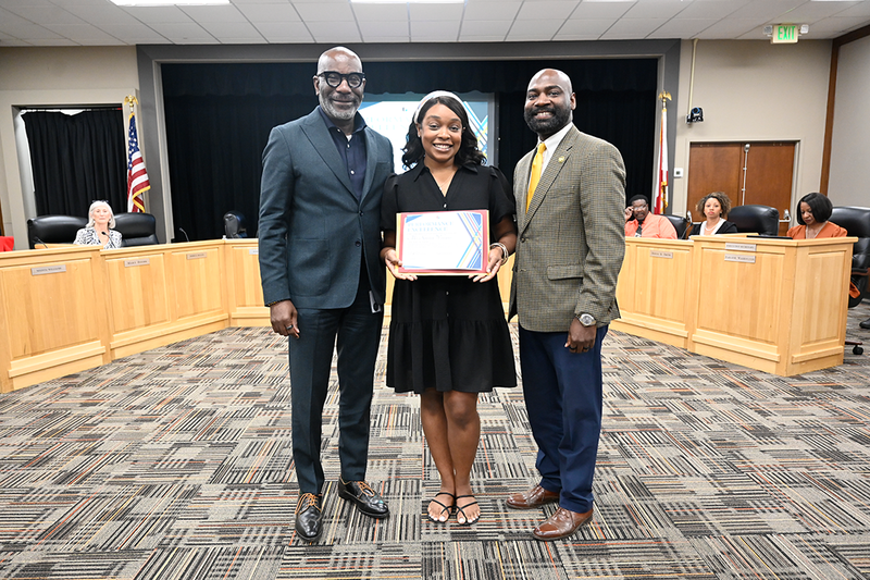 Dr. Mark Sullivan, Kristin Williams, and Board Member James Sullivan