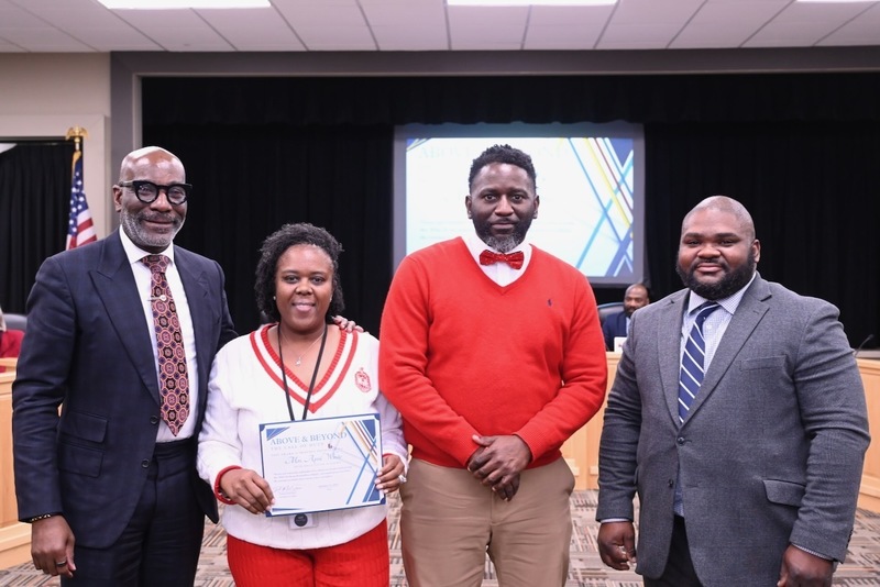 Superintendent Dr. Mark Sullivan, April White, Principal BOBBY PHILLIPS and Board Member Antwon Womack