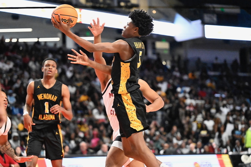 MVP Brendon Davis drives to the hoop