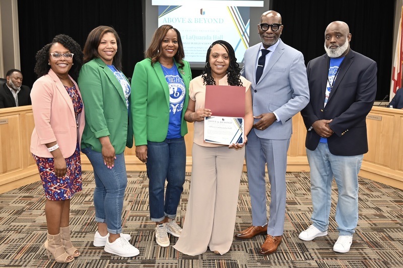 Officer Hall (center)