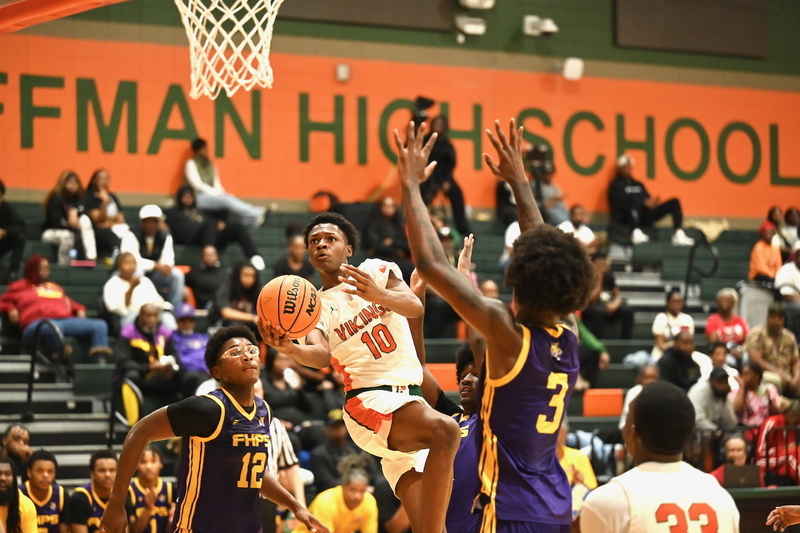 Huffman's Antonio Hill drives for a layup during the team's game against Fairfield.