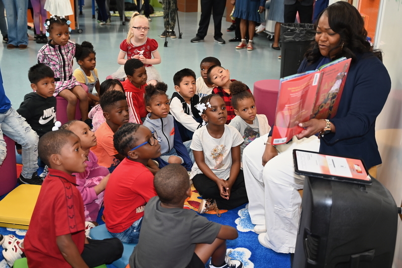 A Hayes teacher reads an interactive book to kindergarten students.