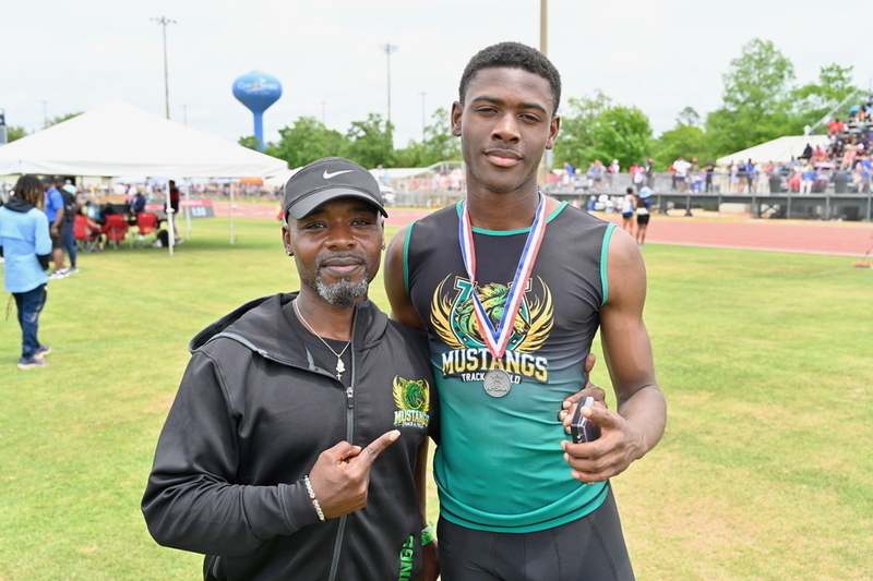 Coach Josh Stillins and Kaius Stewart