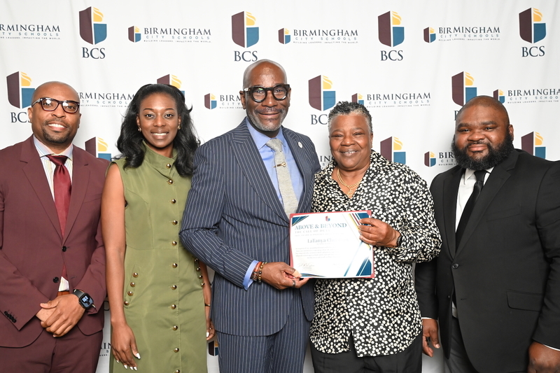 Assistant Principal Dr. Emanuel Foster, Principal Dr. Raynetta Wiggins, Superintendent Dr. Mark Sullivan, LaTanya Christian of Minor Elementary, Board Member Antwon Womack