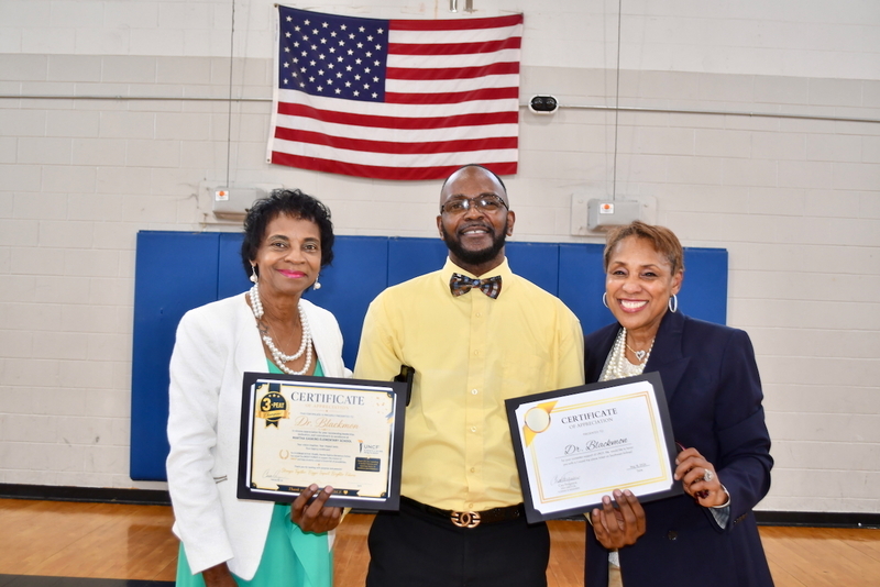 Instructional Superintendent Dr. Gwendolyn Tilghman, Principal Dr. Herbert Blackmon, and UNCF's Casi Ferguson