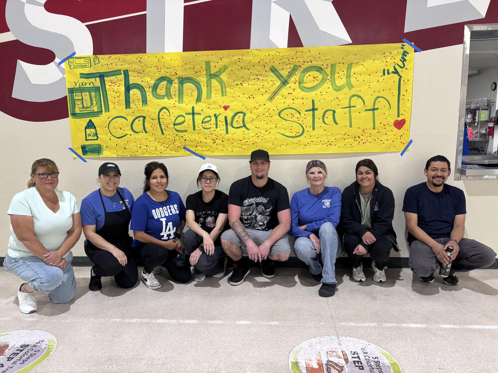 Cafeteria Staff with Thank You Poster