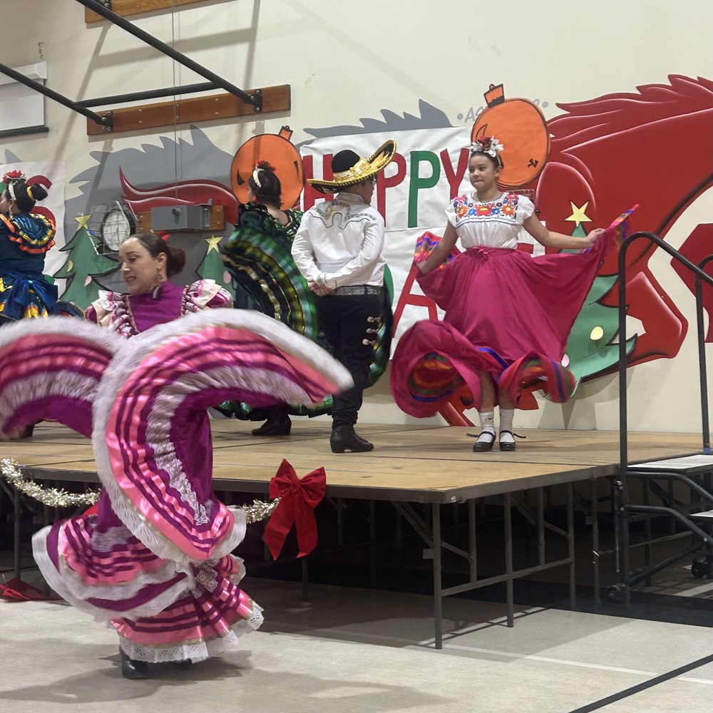 Traditional Mexican dances with colorful dresses