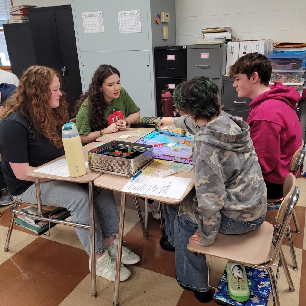 4th Hour students carefully record their data.