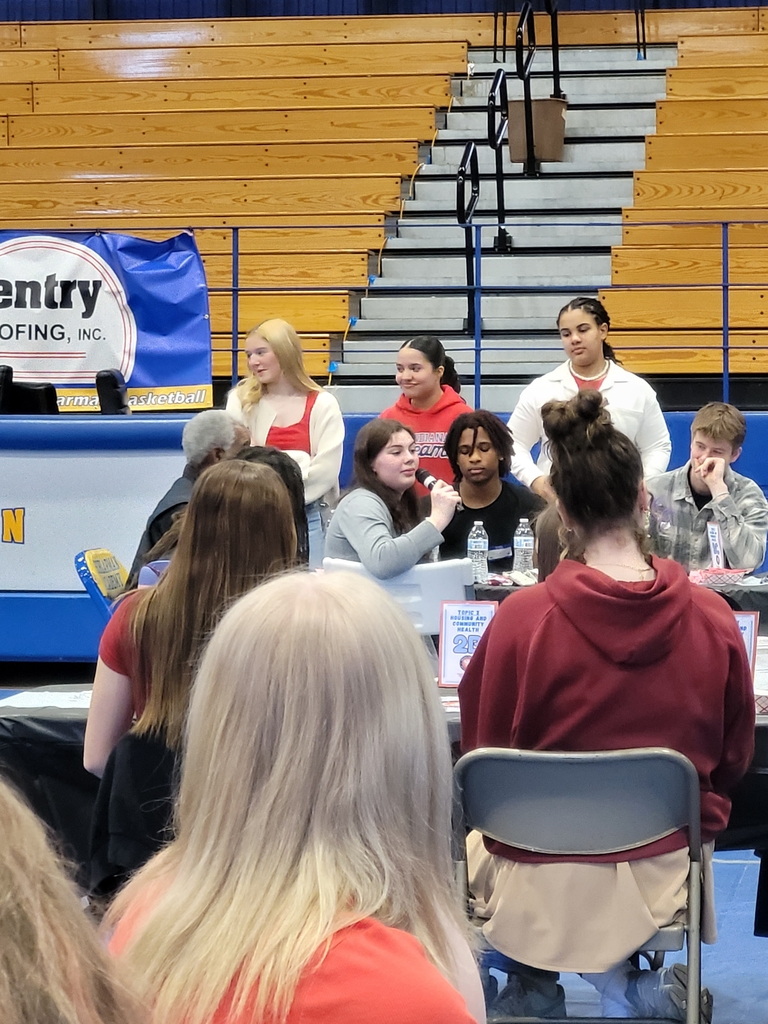 Katie G. addressing the symposium.