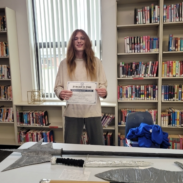 Xzayne E. with his Administrators Award.