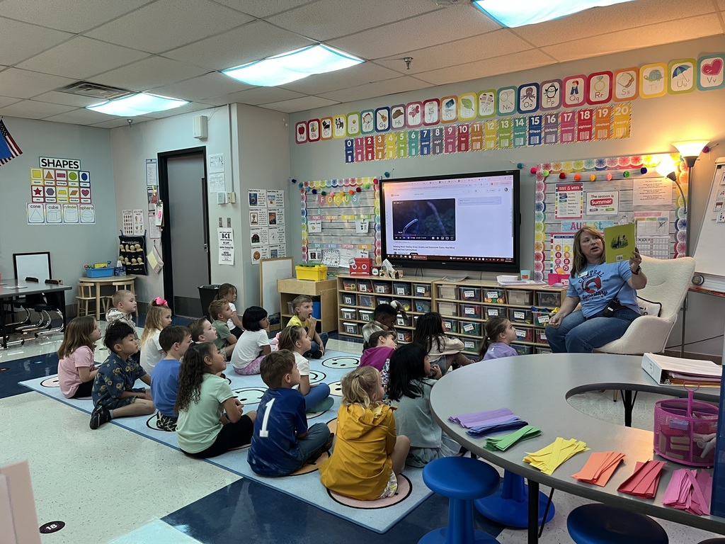 Mrs. Haynes reading to Mrs. Spains class