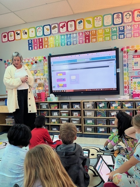 Mrs. Bowman helps Kinder code