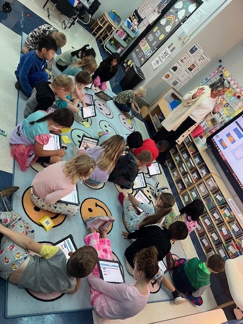 All eyes on Mrs. Bowman while they learn to code.