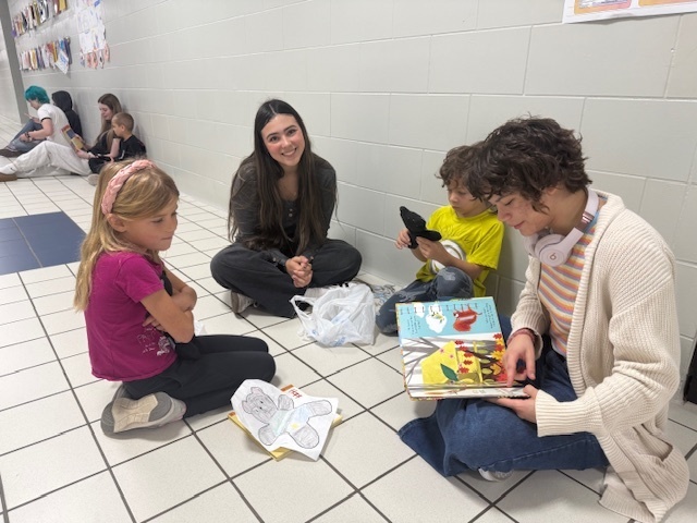 Mrs. Stamm's 1st grade reading bear project with Brenna Humphrey class from the high school.