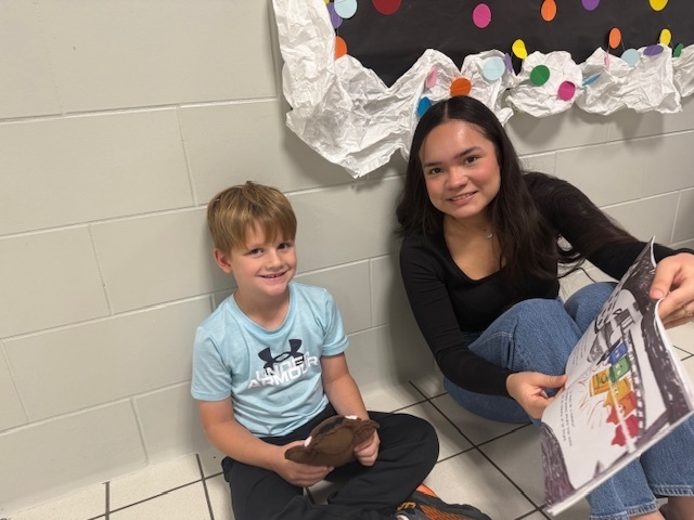 Mrs. Stamm's 1st grade reading bear project with Brenna Humphrey class from the high school.