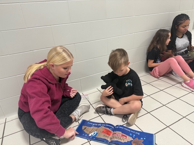 Mrs. Stamm's 1st grade reading bear project with Brenna Humphrey class from the high school.