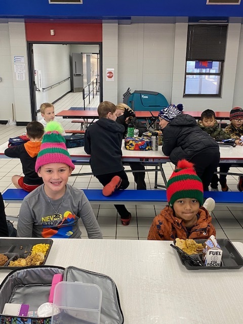 Ms. Lane's kids showing off their new hats