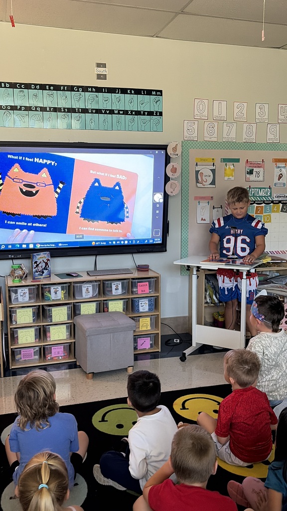 Barrett reading to Mrs. Eccles pre-k class