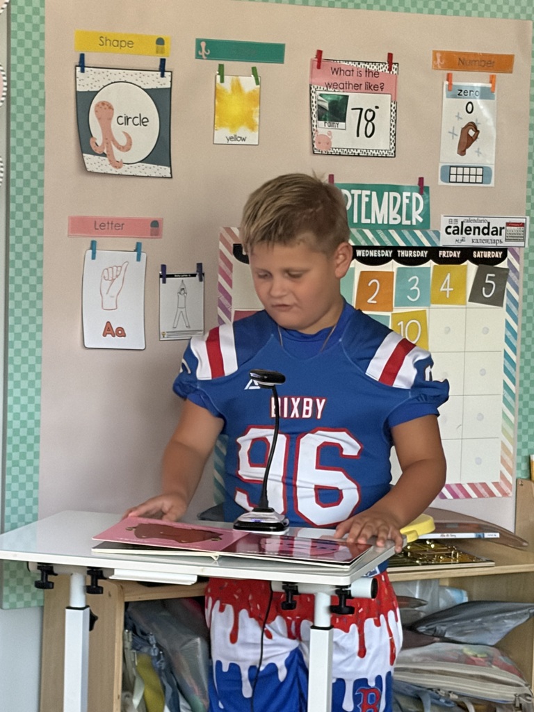Barrett reading to Mrs. Eccles pre-k class