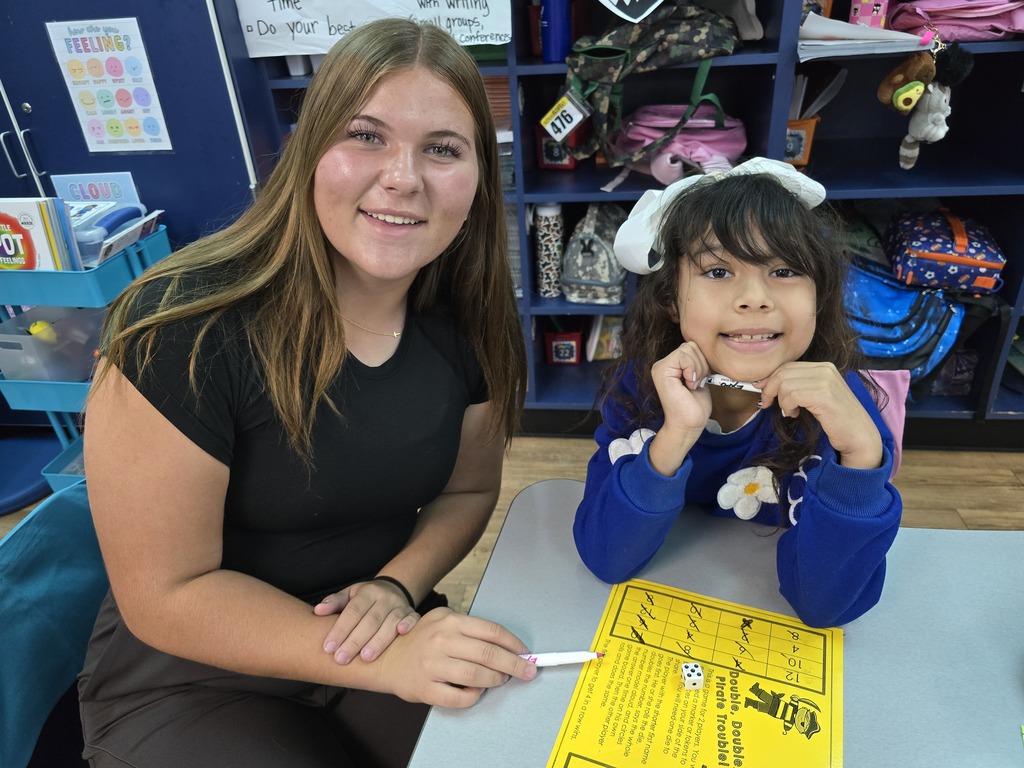 9th grade pen pals visit Ms. Hankins 2nd grade