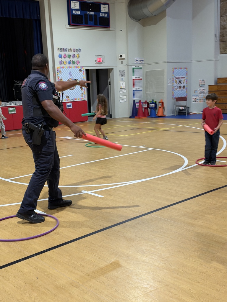Officer Jennings playing zombie tag in PE