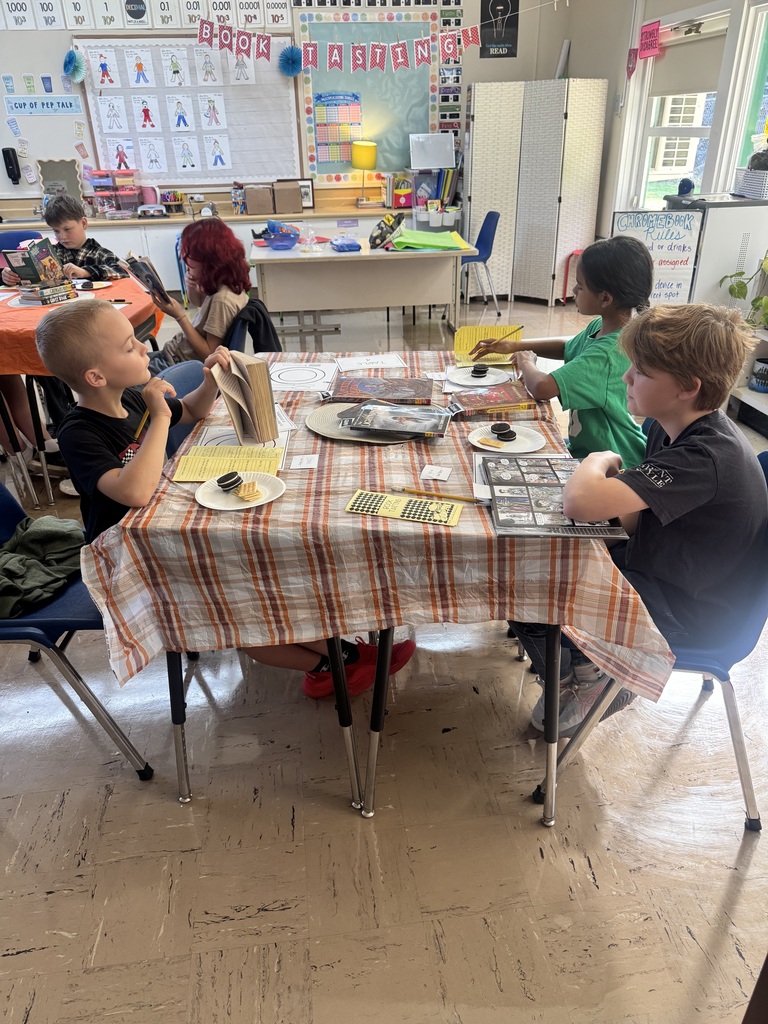 Kids at Diner Tables Sampling Books 2