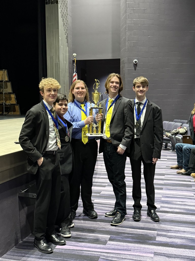 The BRHS Varsity team with the championship trophy: L-R Senior Connor Jobe, Freshman Hunter Holly, Senior Josh Adkins, Senior Stryker Charlton, and Sophomore Bob Dieter.