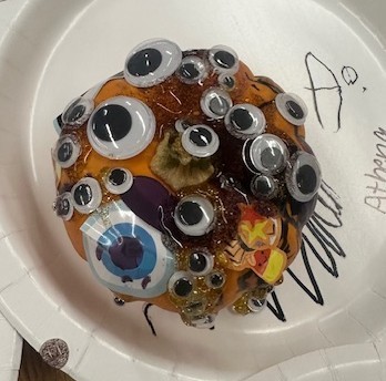 BPS Preschool students decorate pumpkins during their Fun Fall Party