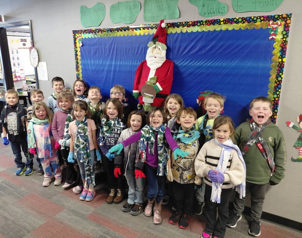 BPS first grade students show off their new scarves and gloves kindly provided by the Montpelier Church of the Nazarene